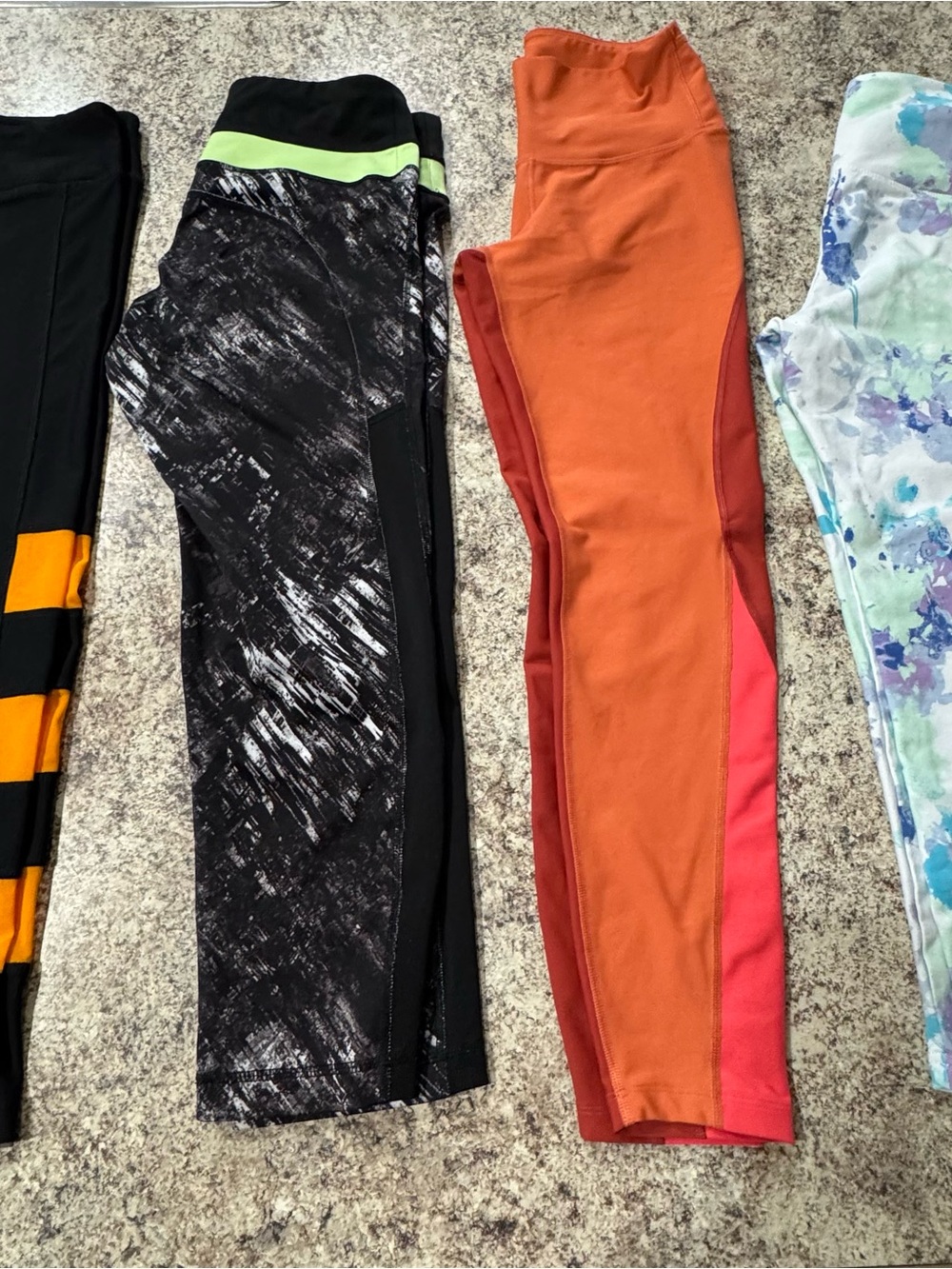 4 pair of Women’s Medium Active Leggings.